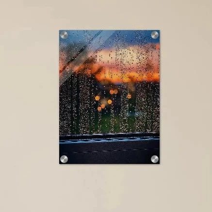 Hyper-realistic close-up of water droplets on a window pane with a blurry, colorful spring garden at dusk in the background.