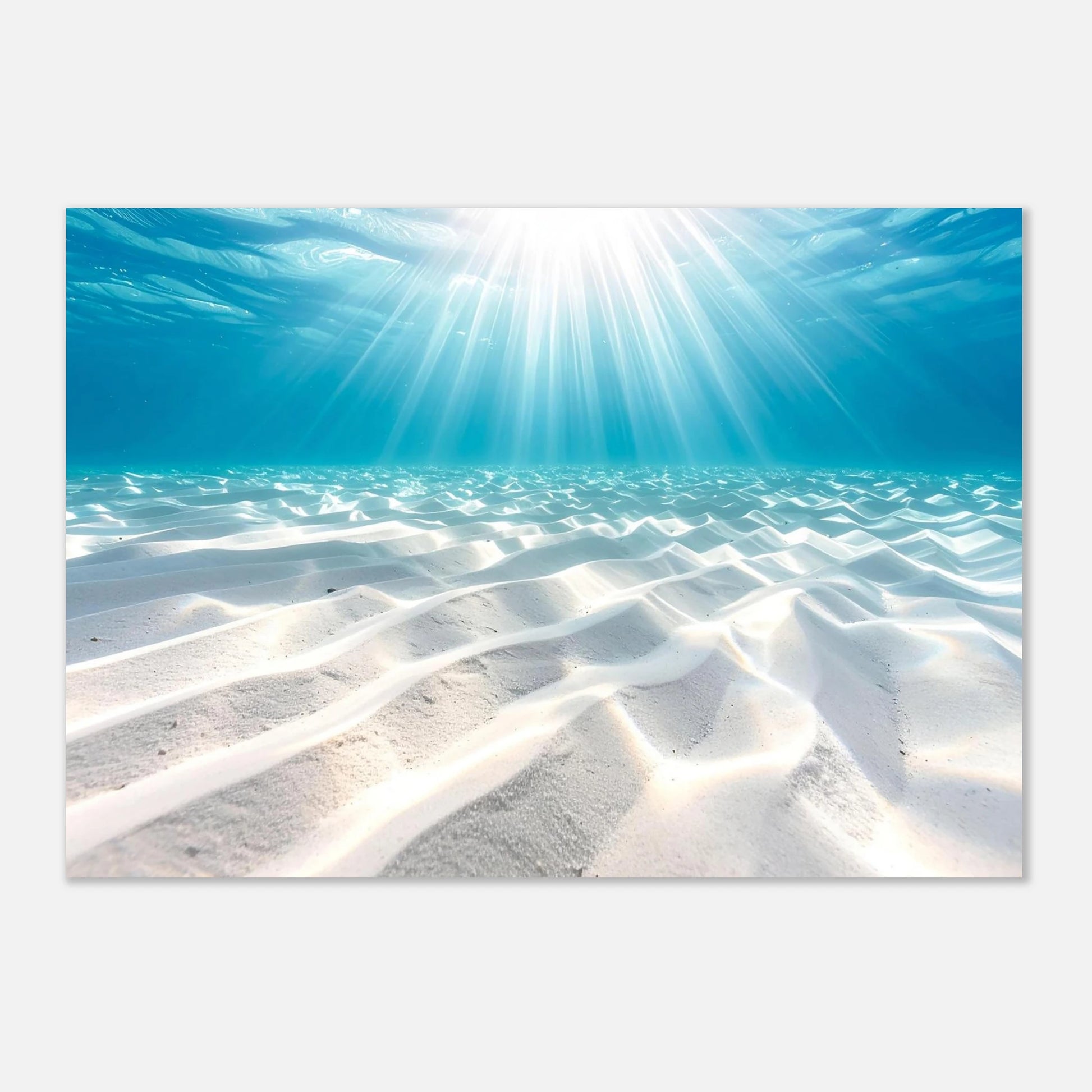 Serene underwater scene with bright sunlight beams piercing through blue ocean water onto white sand.