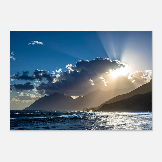 Peaceful mountain range under a clear blue sky with soft sunlight hitting the peaks; tranquil nature wall art.