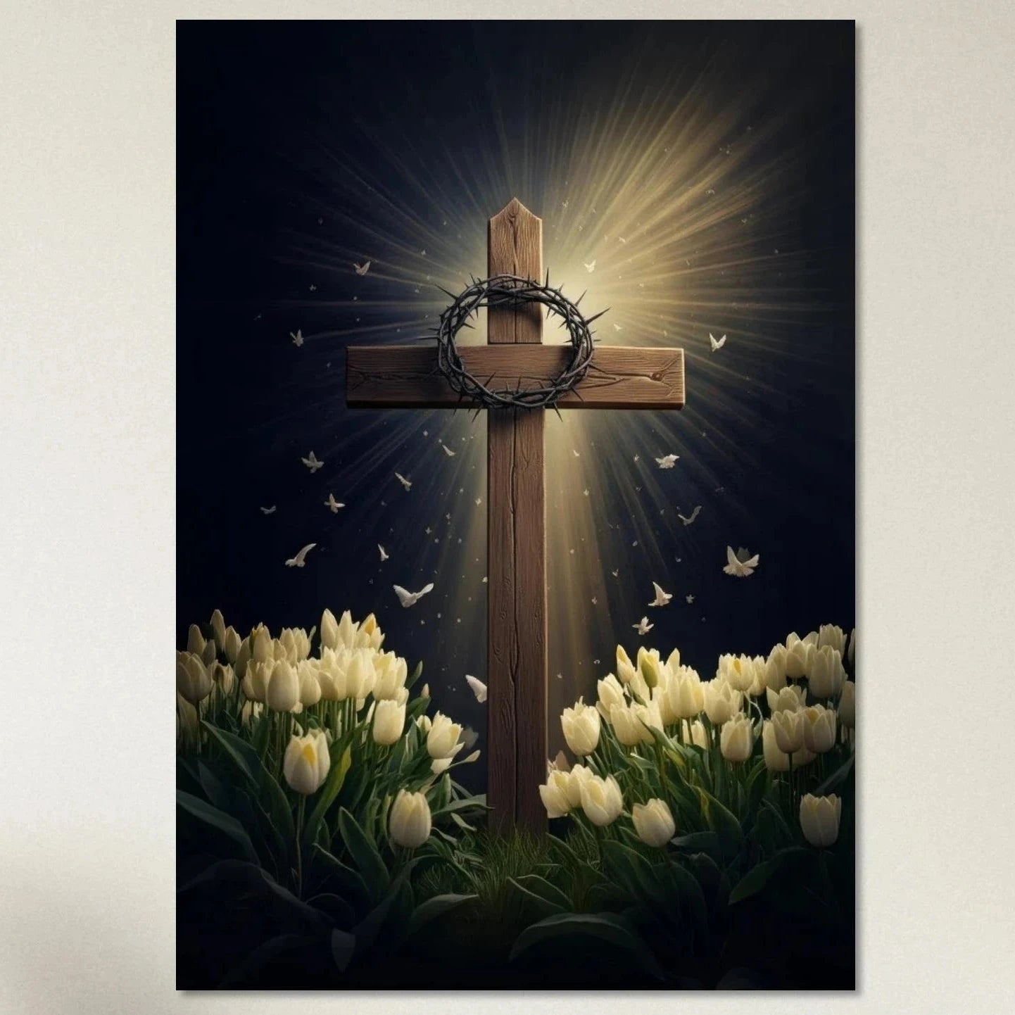 A wooden cross with a crown of thorns and a bed of white tulips at the base.