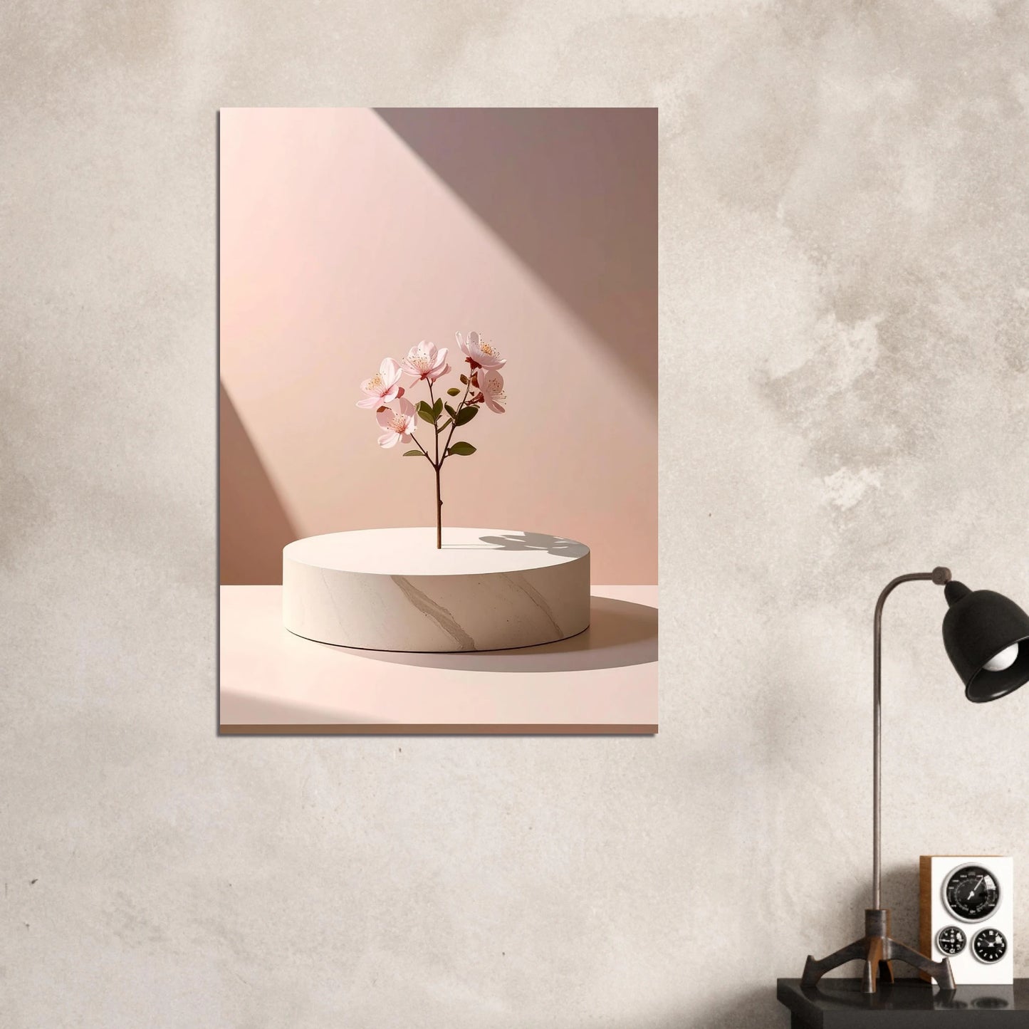 Framed artwork of a minimalist scene with a flower on a white pedestal against a pink background, displayed on a wall.
